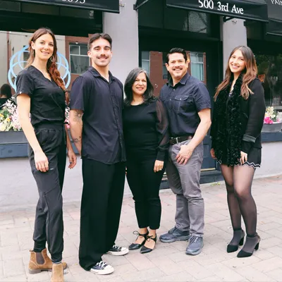 Chiropractor Downtown San Diego CA Kurt & Shaffana Cagasan With Team